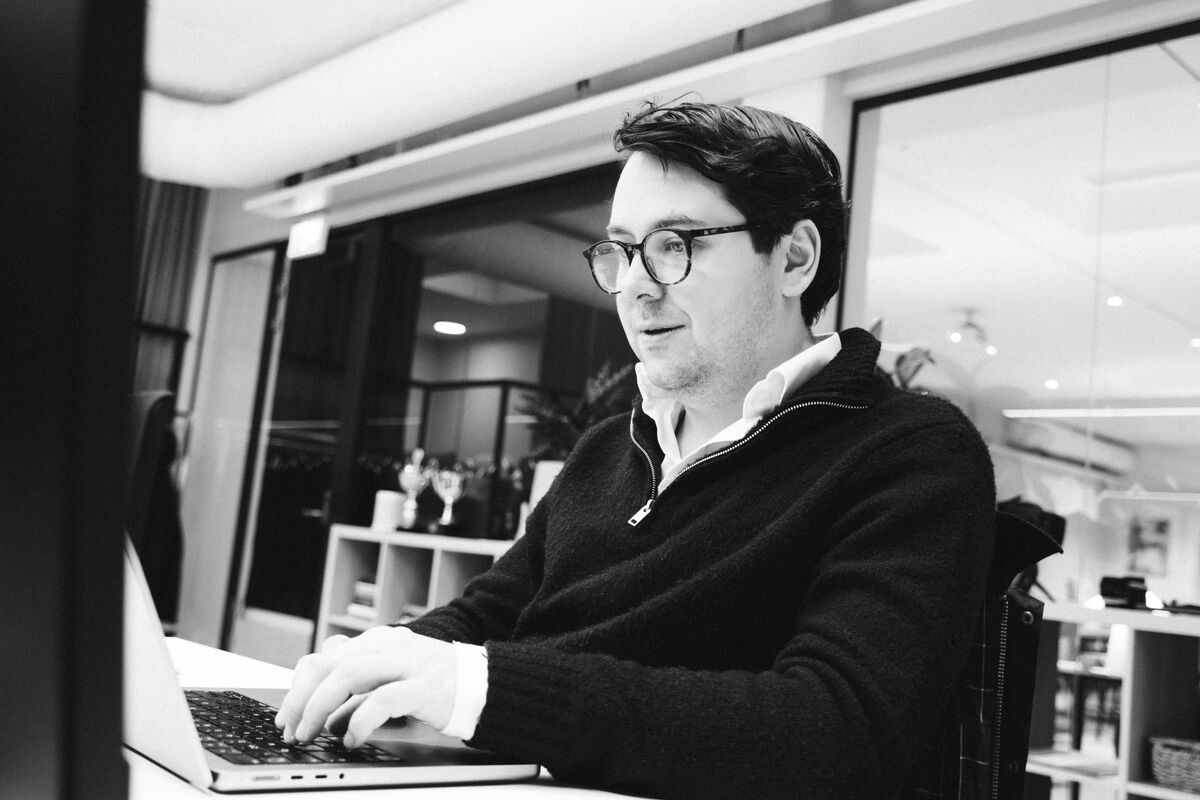 Thobias Cogrell at a laptop in the Alva Labs office in Stockholm