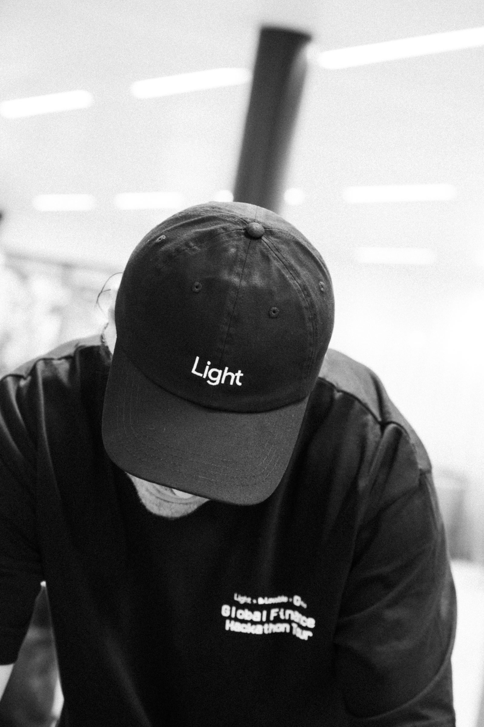 A Light x Lovable x J.P. Morgan t-shirt at a hackathon