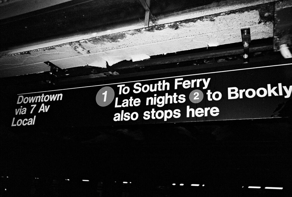 A subway line sign listing every stop on the route